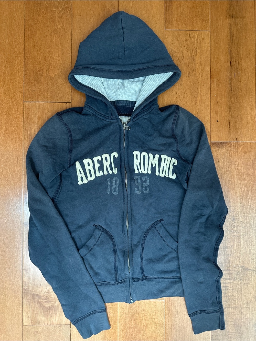 abercrombie kids navy blue zip hooded jacket with cream logo